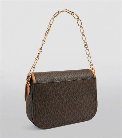 michael kors carrie messenger bag|Michael Kors crossbody Messenger bag.